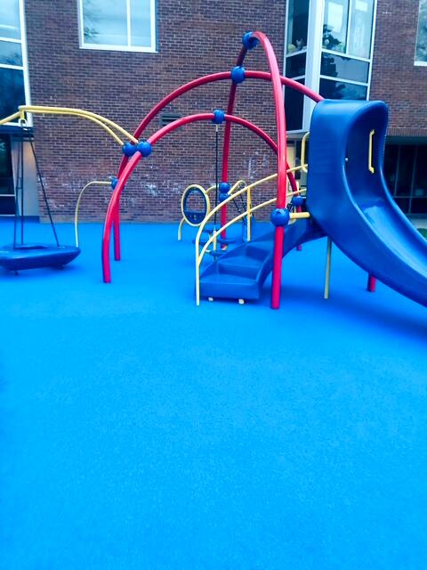 Red and yellow structure on blue rubber